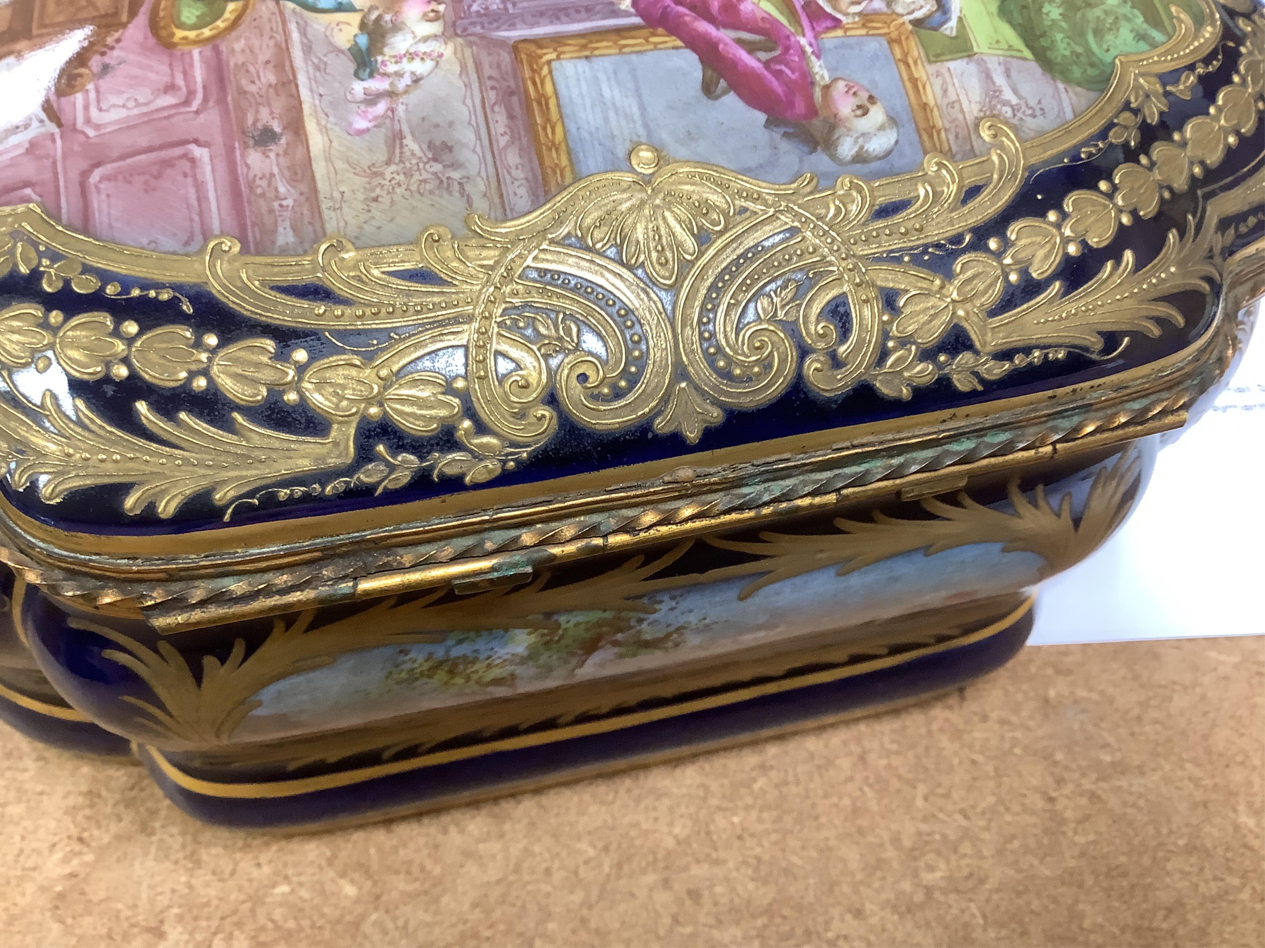 A Sevres style porcelain and ormolu mounted box, 23cm wide